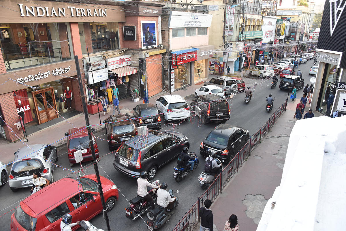 The plan to convert Commercial Street and Brigade Road as non-motorable streets and complete pedestrian roads is also expected to gather various reactions from citizens. Apart from this, the introduction of Commuter Card, a single card for both BMTC and Metro services is expected to make a seamless ticketing system for both modes of transportation. (DH file photo)