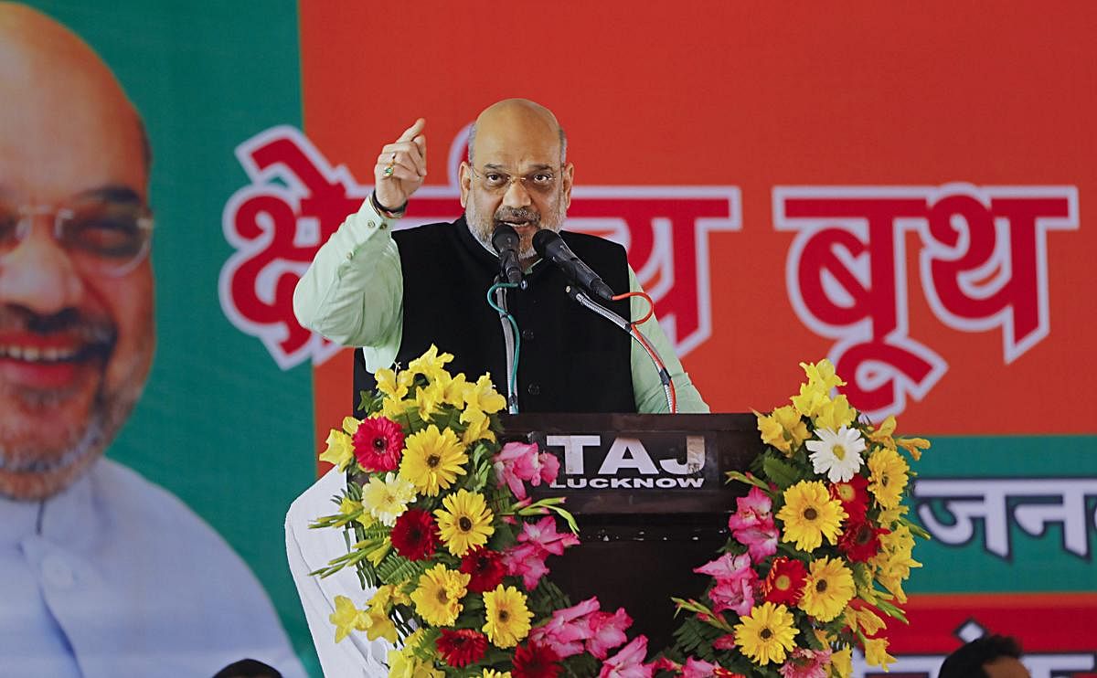 BJP President Amit Shah addresses the booth level unit presidents and other office-bearers of Gorakhpur Zone in Maharajganj, Friday, Feb 8, 2019. (PTI Photo)