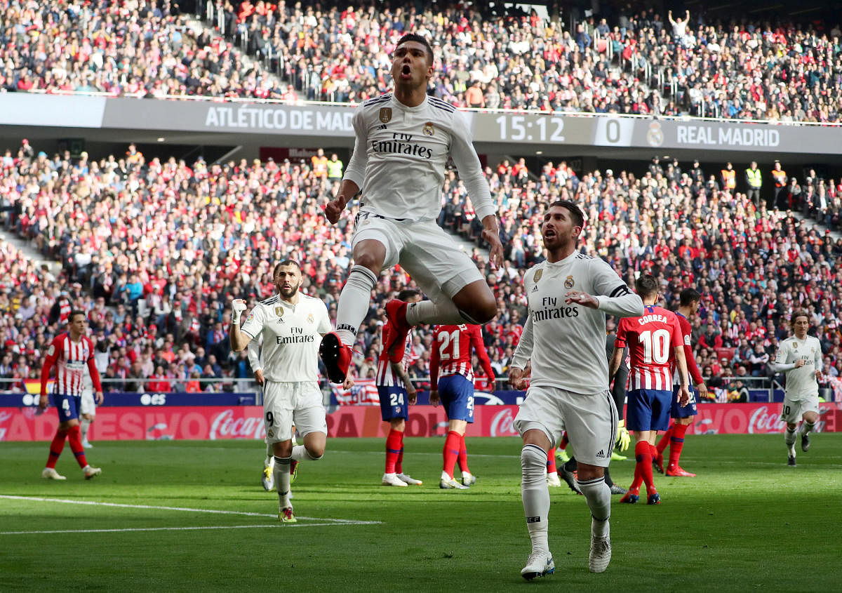 Real Madrid's Casemiro celebrates scoring their first goal. REUTERS