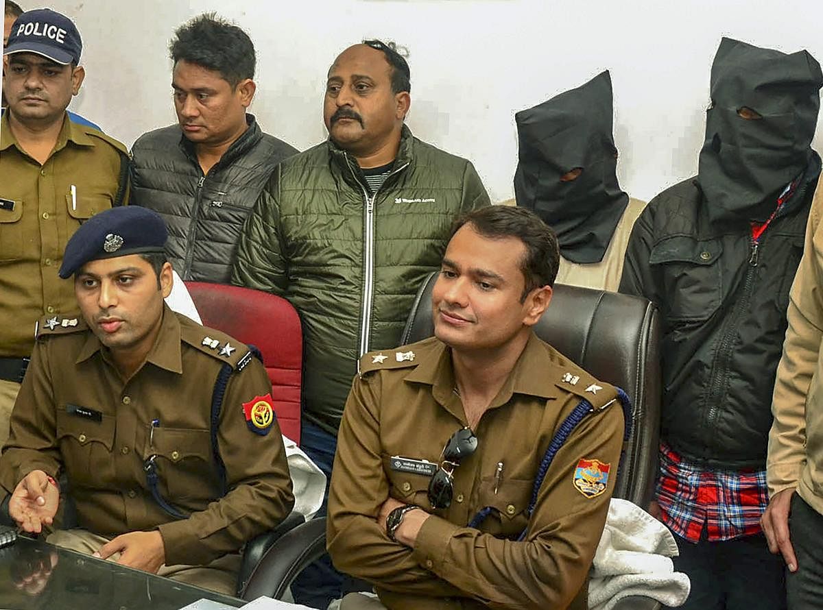 Senior police officers address a press conference after the arrest of the accused persons who were involved in selling illicit liquor, in Roorkee, Sunday, Feb 10, 2019. (PTI Photo)