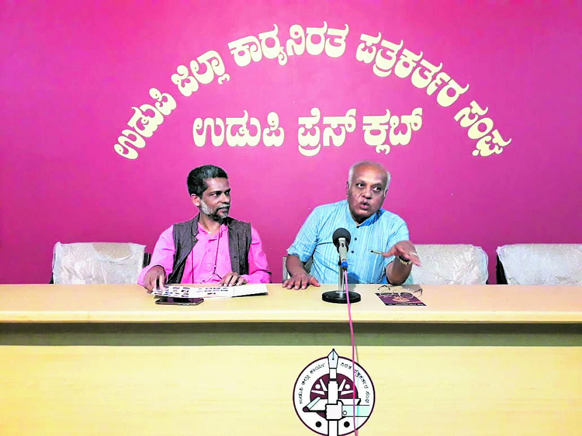 Karnataka Nataka Academy President J Lokesh speaks to mediapersons in Udupi.