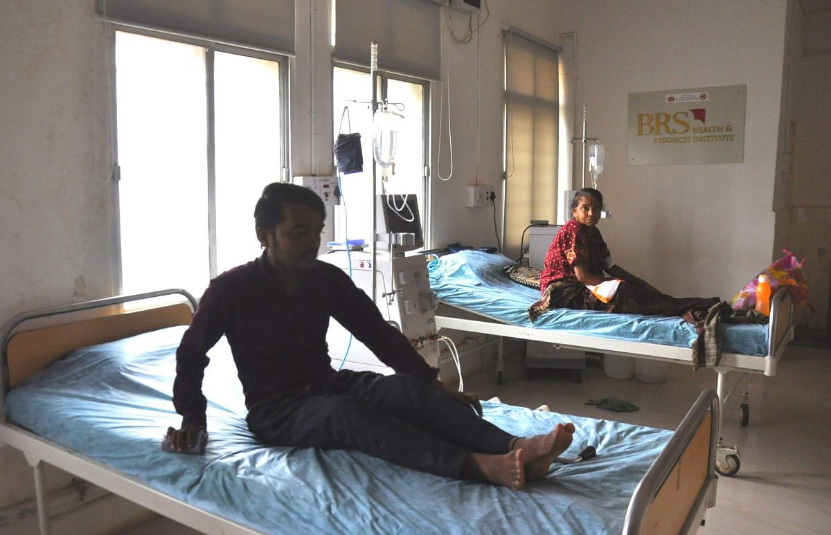 Due to power disruption patients at the 100-bed government hospital in Hosapete waiting for treatment on Monday. DH Photo