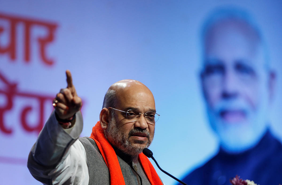 Amit Shah, president of India's ruling Bharatiya Janata Party (BJP) addresses party workers in Ahmedabad on Tuesday. (REUTERS)