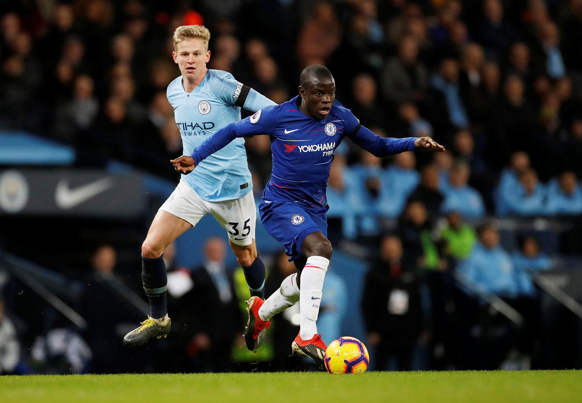 TOUGH TIMES: Chelsea's N'Golo Kante (right) feels his team needs to stay positive to get back on track after the 0-6 drubbing at the hands of Manchester City. Reuters File Photo