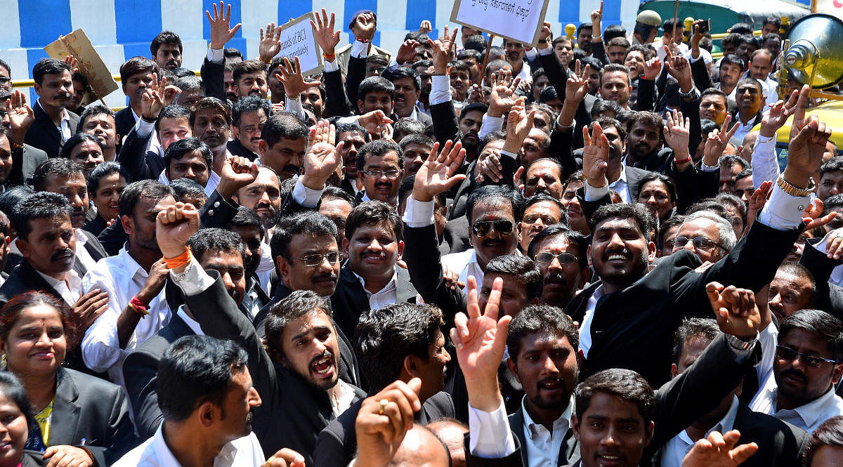 Lawyers protest near the Freedom Park on Tuesday. DH PHOTO/RANJU P