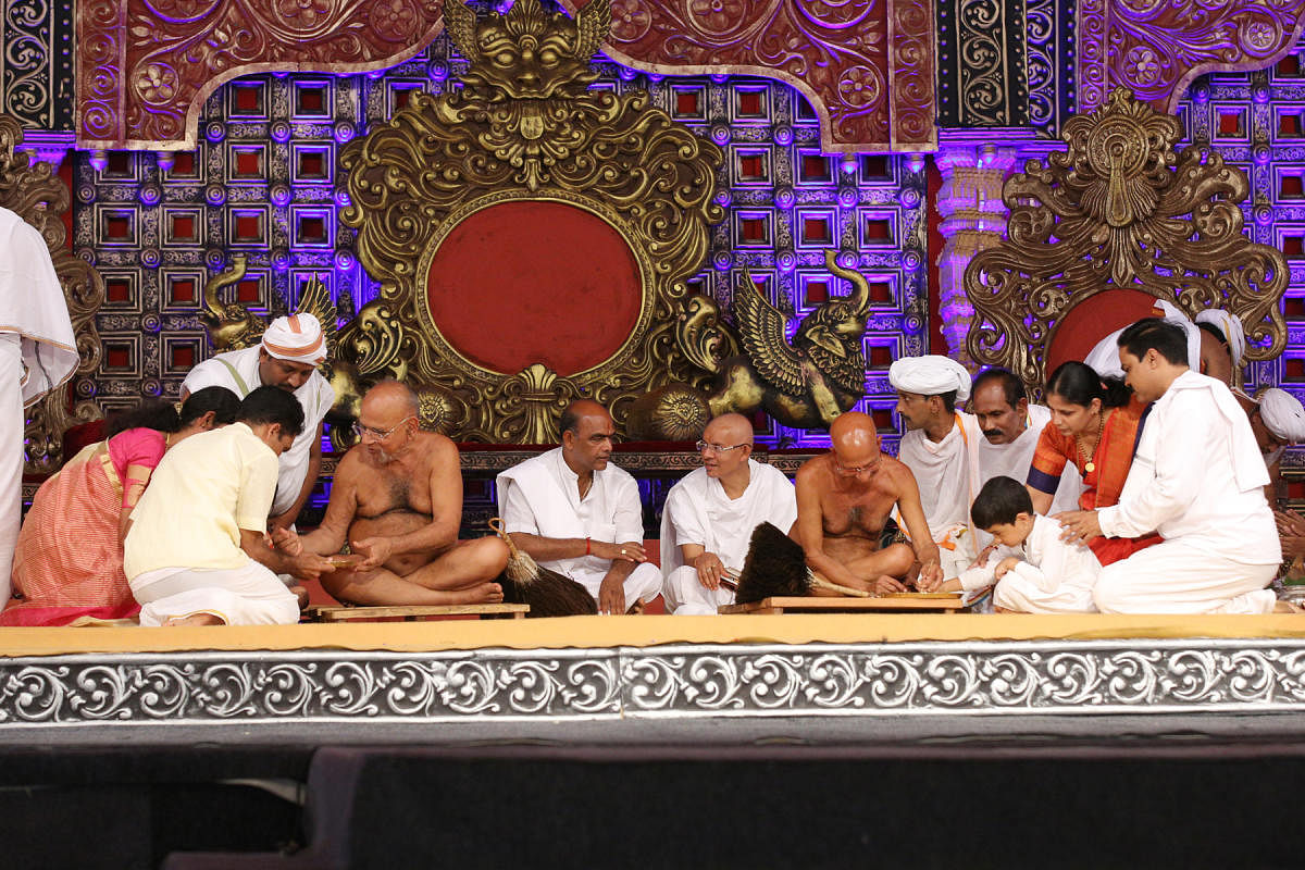 Acharya Sri Vardhamana Sagara Munimaharaja initiates Vrathopadesha at Dharmasthala on Tuesday.