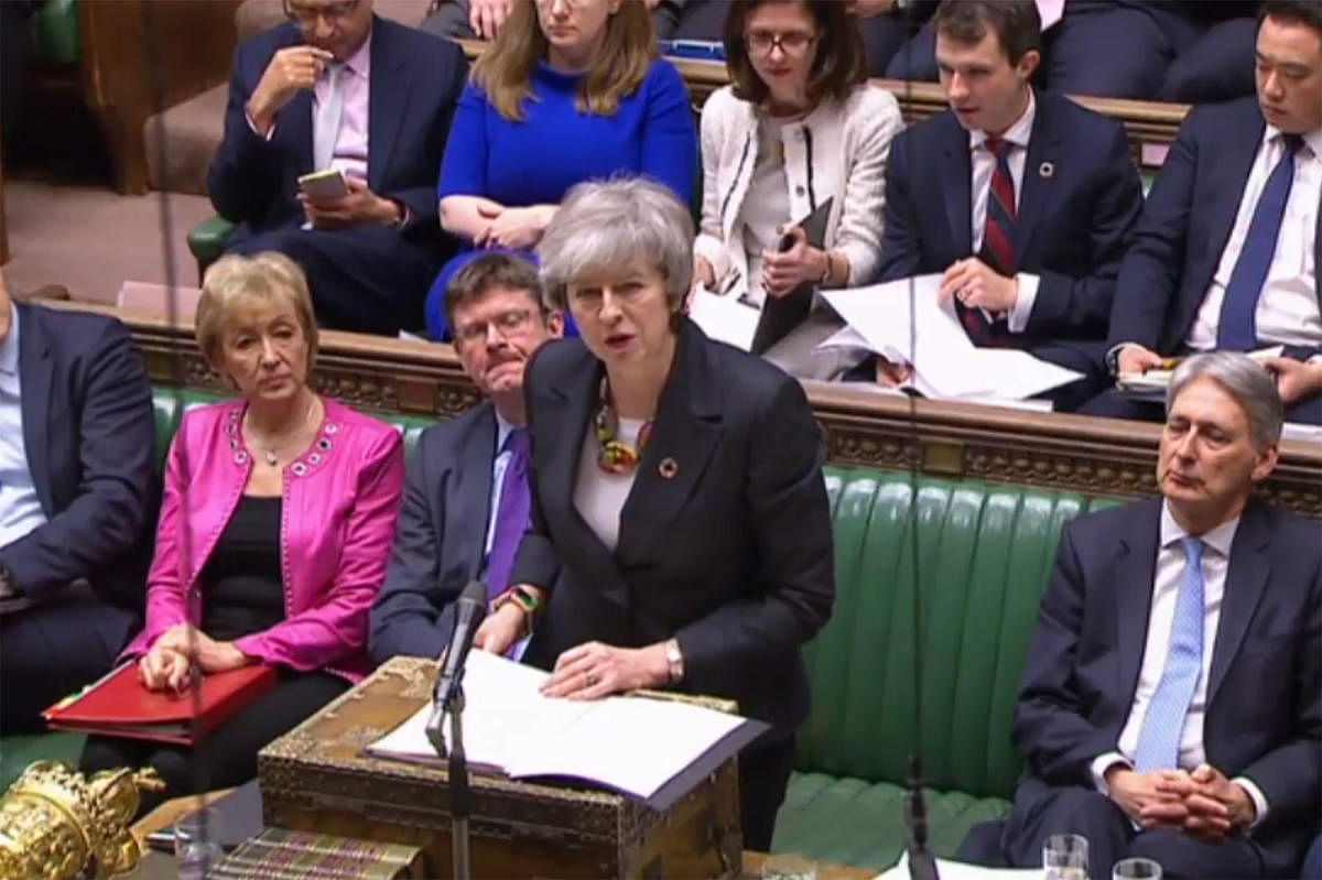 A video grab from footage broadcast by the UK Parliament's Parliamentary Recording Unit (PRU) shows Britain's Prime Minister Theresa May making a statement on Brexit in the House of Commons in London on February 12, 2019. (Photo by HO / various sources /