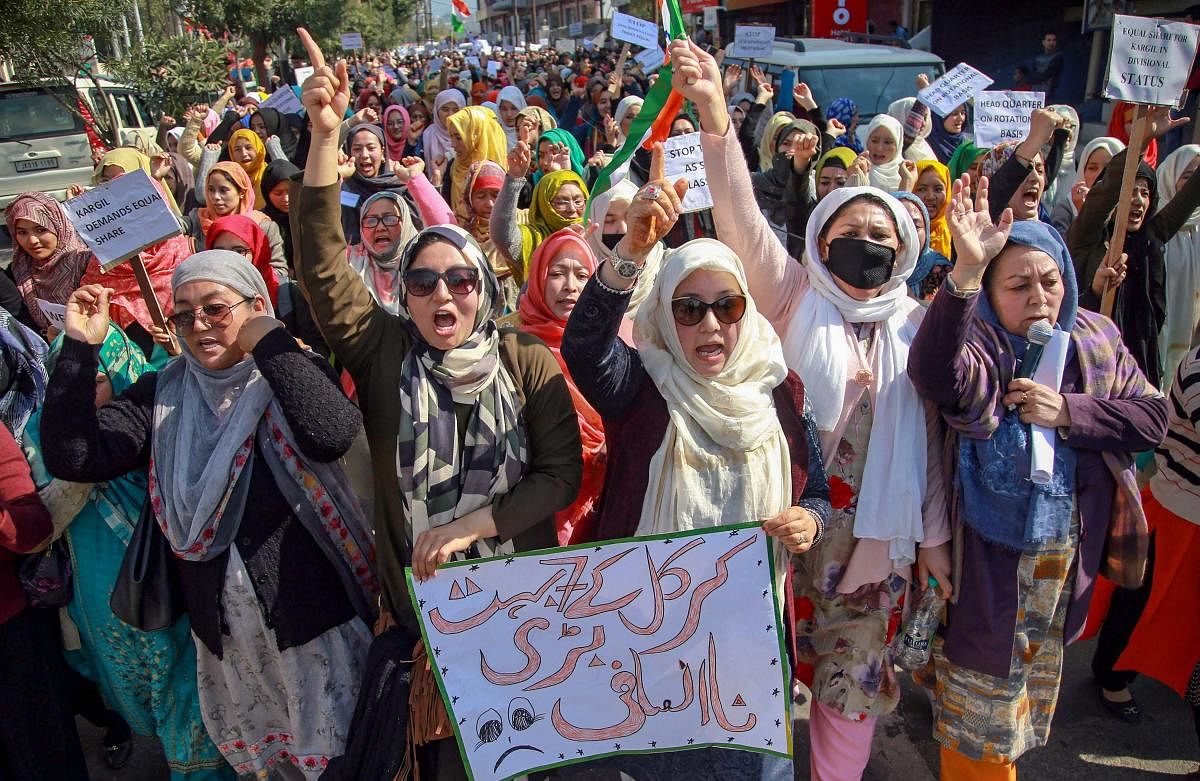  Residents of Kargil district raise slogans during a protest against Leh being made the permanent headquarters of the newly created Ladakh division, in Jammu, Monday, Feb. 11, 2019. (PTI Photo)