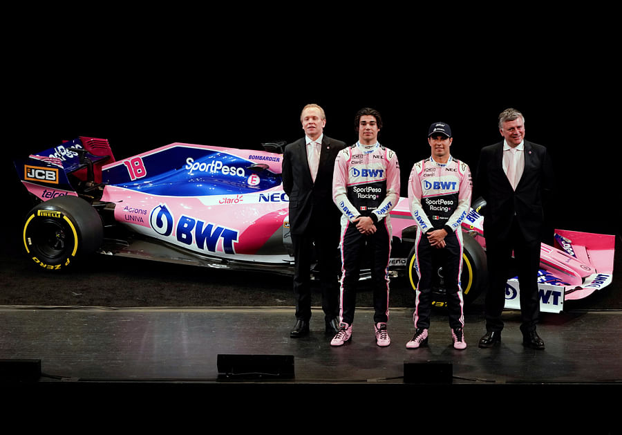 Racing Point F1 Team drivers Lance Stroll and Sergio Perez pose with team principal and CEO Otmar Szafnauer and technical director Andrew Green during the unveiling of the livery in Toronto on Wednesday. Picture credit: Reuters 