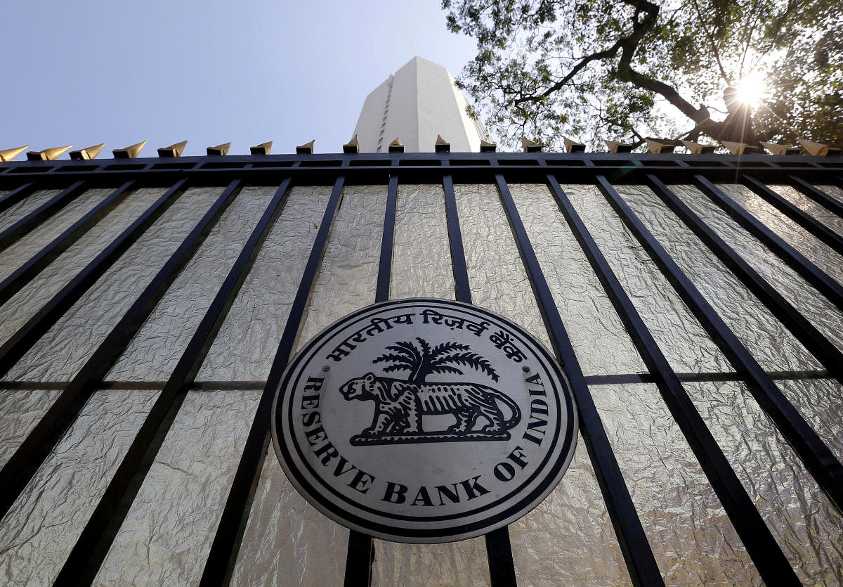 The Reserve Bank of India (RBI) seal is pictured on a gate outside the RBI headquarters in Mumbai. REUTERS