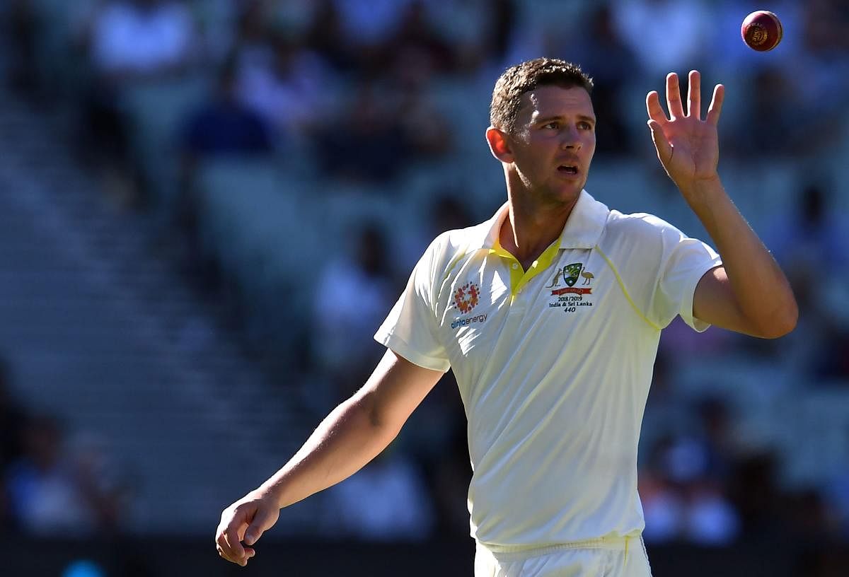 RACE AGAINST TIME: Australian pacer Josh Hazlewood is struggling from a back injury. AFP File Photo