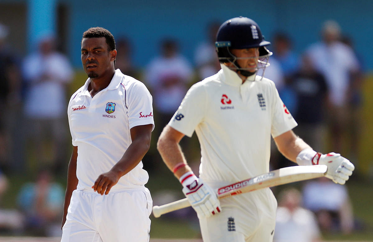 West Indies' Shannon Gabriel (left) extended an unreserved apology for his interaction with Joe Root during the third Test in St Lucia. REUTERS 