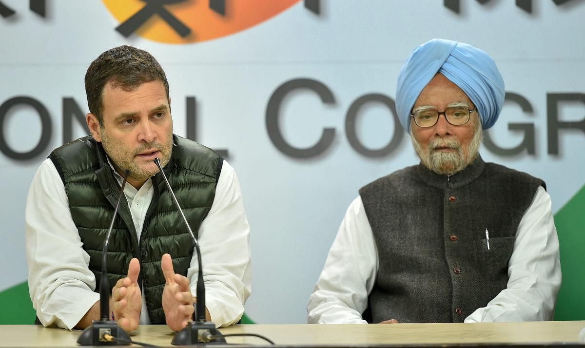 Congress President Rahul Gandhi addresses a press conference to condemn Pulwama terror attack, in New Delhi, on Friday. Former prime minister Manmohan Singh is also seen. (PTI Photo)