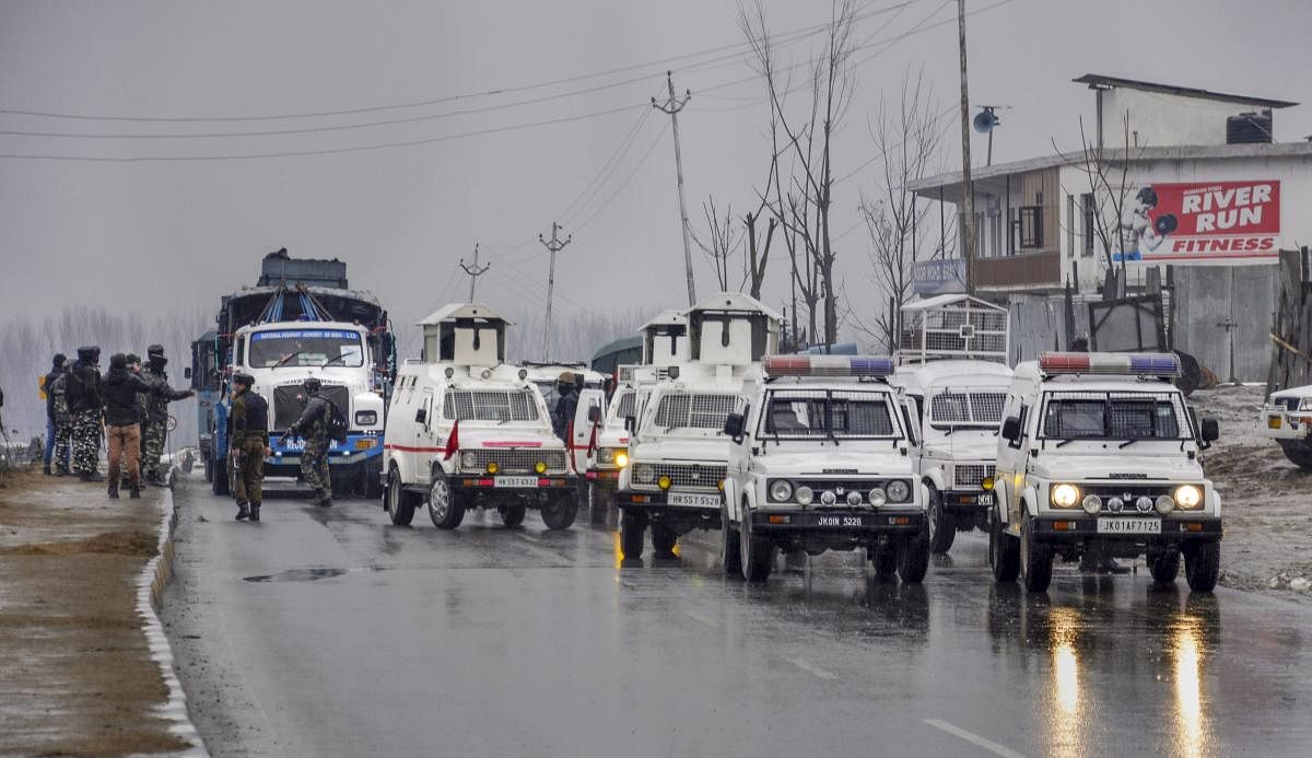 Lathepora: Security forces cordon off the site of suicide bomb attack at Lathepora Awantipora in Pulwama district of south Kashmir, Thursday, February 14, 2019. At least 30 CRPF jawans were killed and dozens other injured when a CRPF convoy was attacked.
