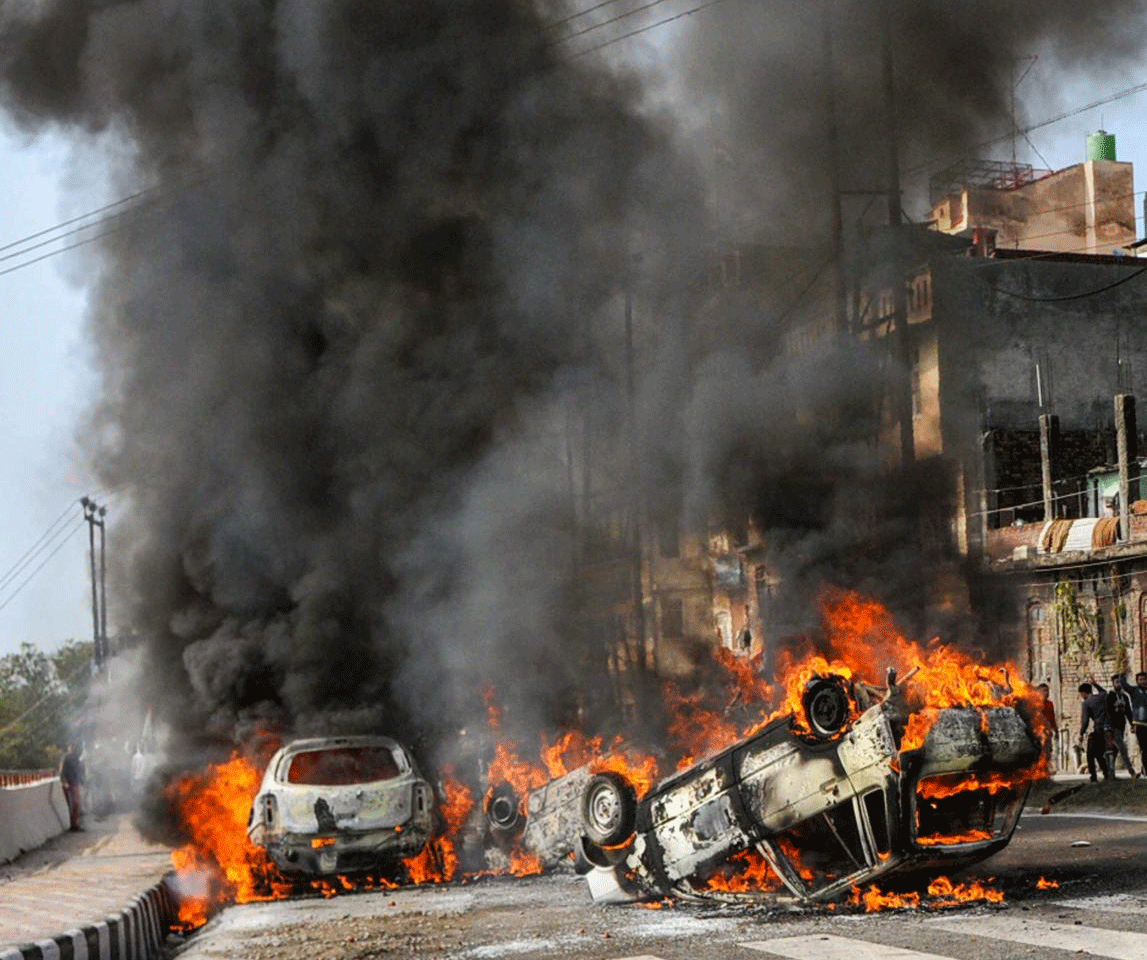 Vehicles set on fire by protestors against the killing of 49 CRPF personnel in the Pulwama terror attack, during a shutdown call given by Jammu Chamber of Commerce and Industry (JCCI), in Jammu. (PTI Photo)