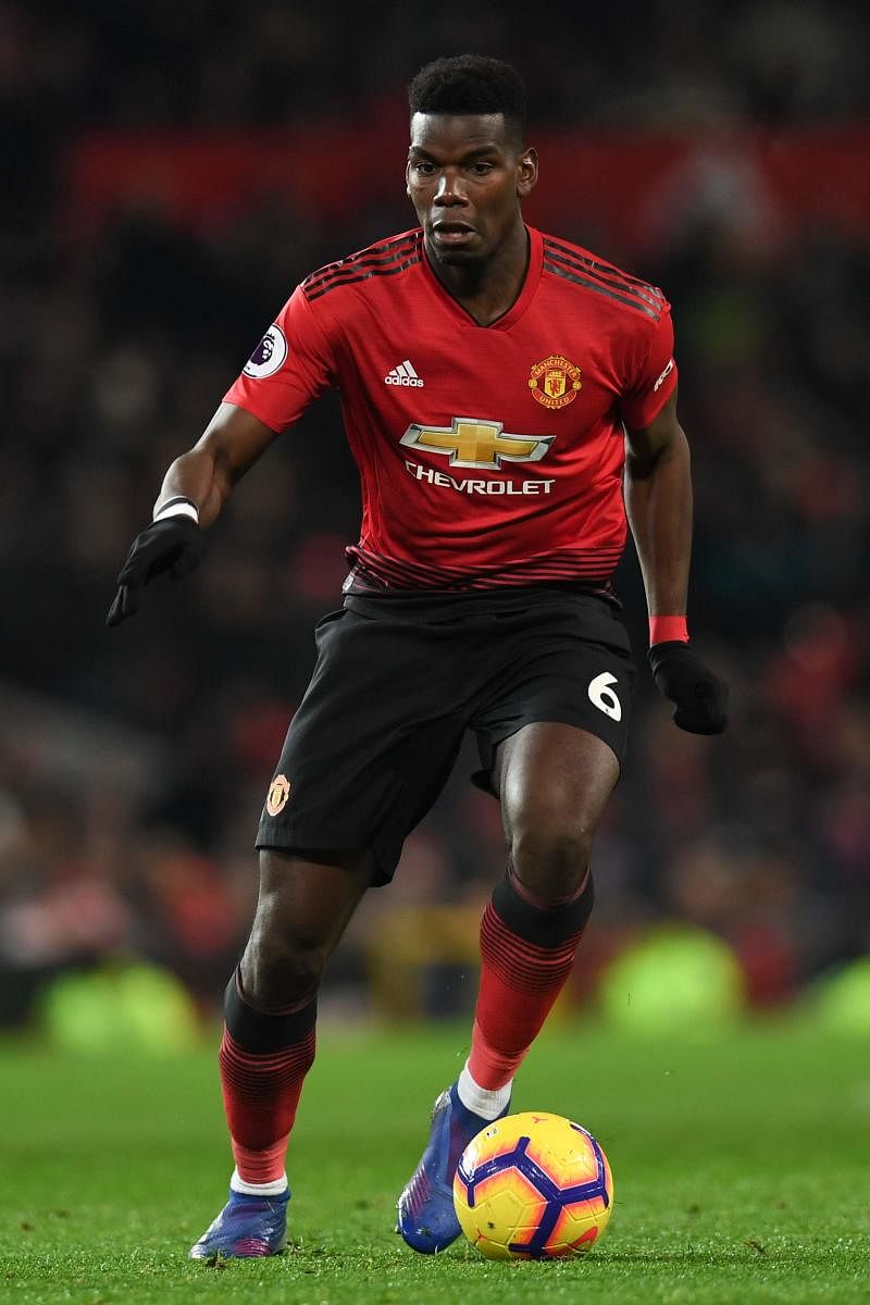 Having rediscovered his attacking touch, play-maker Paul Pogba will be looking to inspire Manchester United when they host PSG in the first leg last-16 clash on Tuesday. AFP