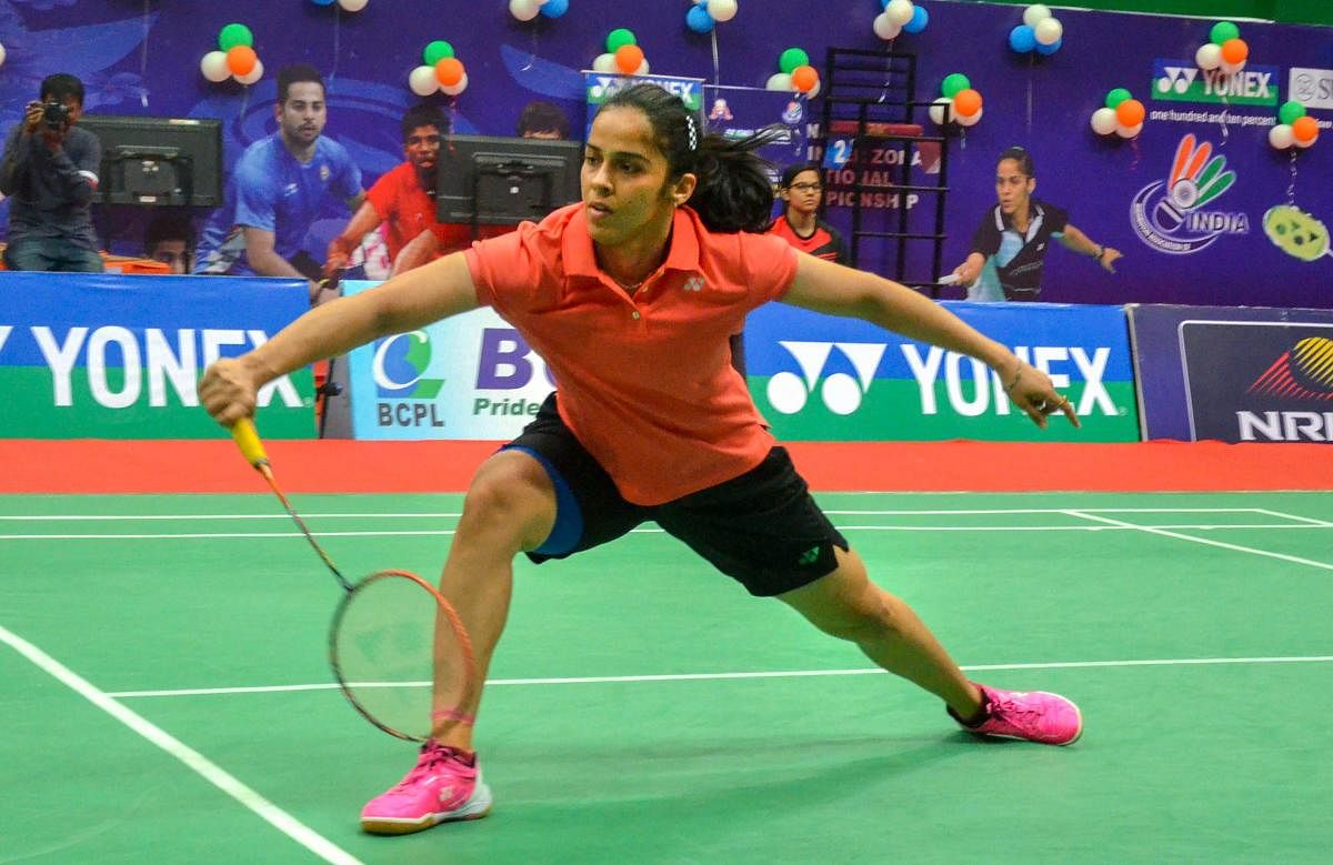 Saina Nehwal produced a dominating performance to tame PV Sindhu in the women's final and claim her fourth Senior National badminton title on Saturday. PTI