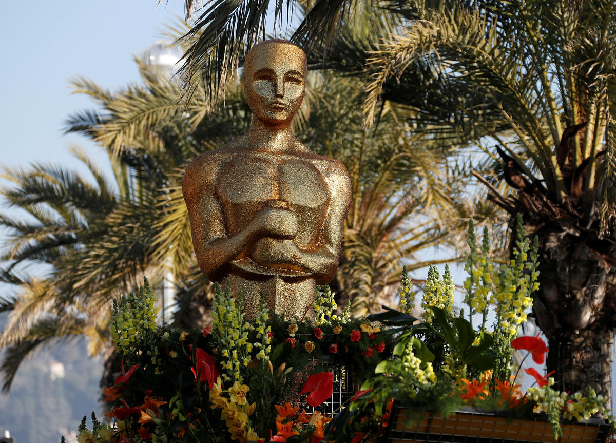 An Oscar statue is seen during the flower parade as part of the Carnival of Nice, France. (Reuters Photo)