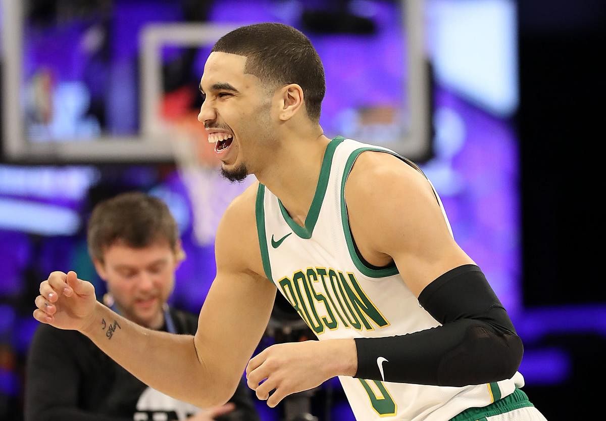 CHARLOTTE, NORTH CAROLINA - FEBRUARY 16: Jayson Tatum #0 of the Boston Celtics celebrates during the Taco Bell Skills Challenge as part of the 2019 NBA All-Star Weekend at Spectrum Center on February 16, 2019 in Charlotte, North Carolina. Streeter Lecka/Getty Images/AFP
