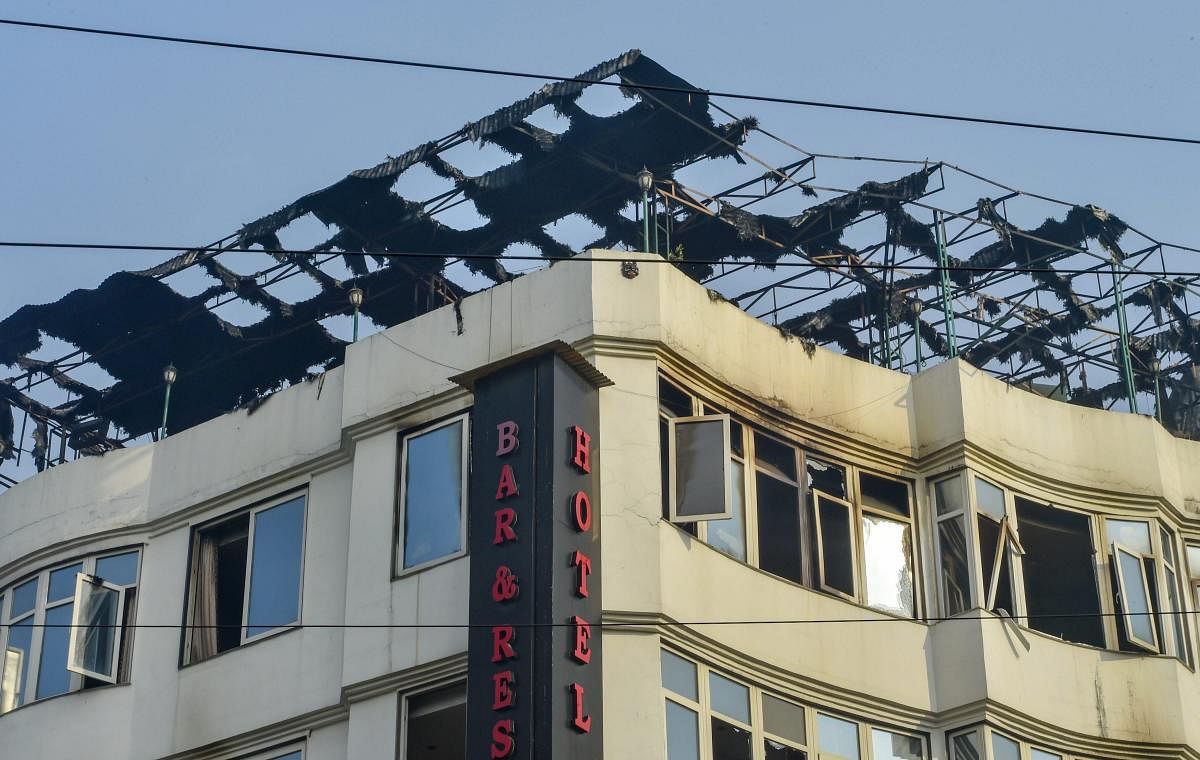 A view of the charred remains on the rooftop of Karol Bagh's Hotel Arpit Palace where a massive fire broke out, in New Delhi, on February 12, 2019. PTI