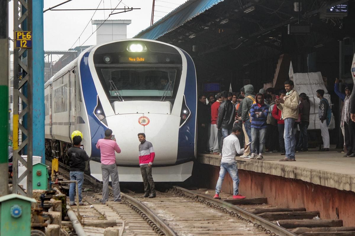 Vande Bharat Express, India's first semi-high speed train, arrives back from Varanasi after its inaugural run at New Delhi Railway Station, Saturday, Feb. 16, 2019. Vande Bharat Express ran into some trouble early Saturday while returning to Delhi from Va