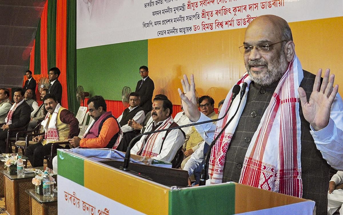 BJP President Amit Shah addresses the foundation stone laying ceremony of Assam state BJP office, in Guwahati. (PTI Photo)
