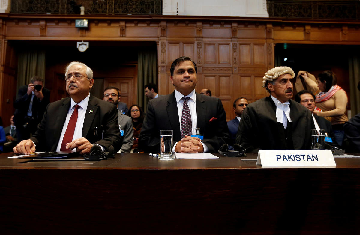 (L-R) Attorney Anwar Mansoor Khan, Pakistani foreign office spokesperson Mohammad Faisal and Queen's Counsel Khawar Qureshi are seen at the International Court of Justice during the final hearing of the Kulbhushan Jadhav case in The Hague, the Netherlands