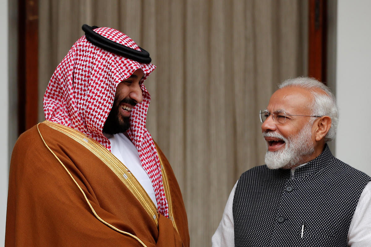 Saudi Arabia's Crown Prince Mohammed bin Salman and India's Prime Minister Narendra Modi react ahead of their meeting at Hyderabad House in New Delhi, India, February 20, 2019. REUTERS