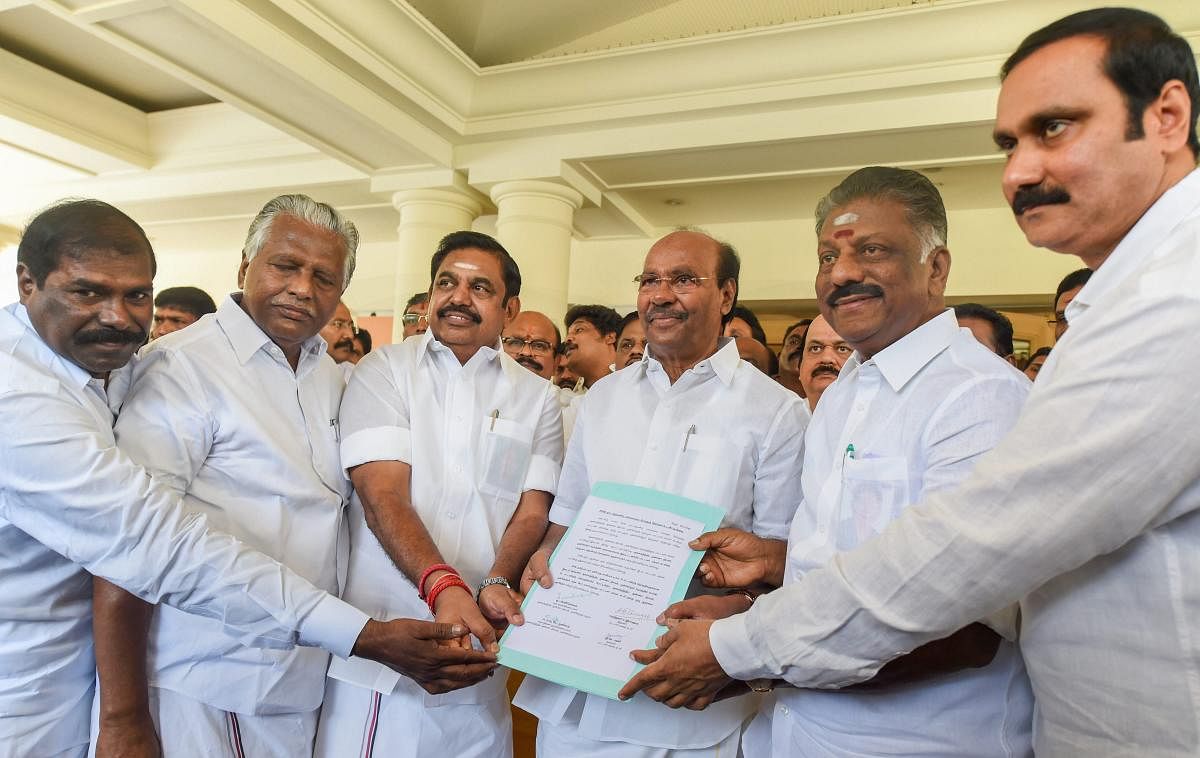 Tamil Nadu Chief Minister Edappadi K Palaniswami, Deputy Chief Minister O Panneerselvam and senior leaders of AIADMK and PMK show a signed copy of alliance agreement for the upcoming Lok Sabha elections, in Chennai, on February 19, 2019. PTI