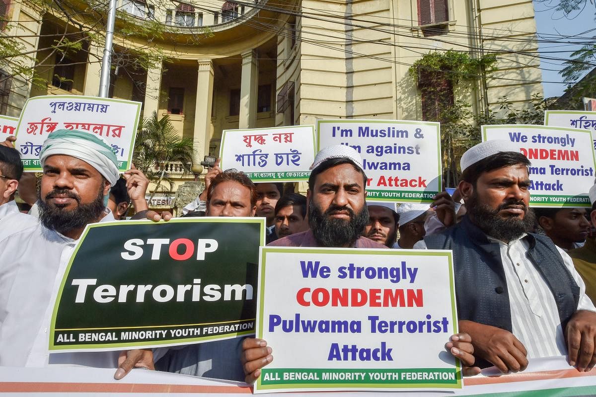 Members of All Bengal Minority Youth Federation participate in a demonstration protest against the Pulwama terror attack, in Kolkata on Wednesday. PTI