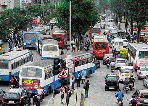 The congested BMTC bus stand at the Silk Board junction. DH Photo