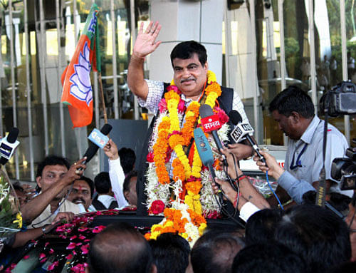 Union Minister for Transport and Shipping Nitin Gadkari being welcomed by supporters on his arrival at Nagpur airport on Tuesday after the Assembly election results. PTI Photo