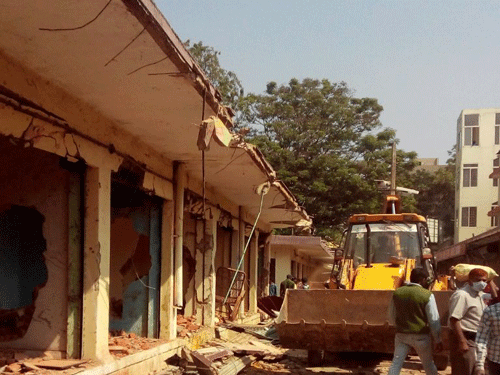 The Bruhat Bengaluru Mahanagara Palike (BBMP) has begun the demolition drive in Malleshwarm market area. So far 80 shops have been demolished to make way for market development project planned jointly by the Bangalore Development Authority  and BBMP. DH Photo