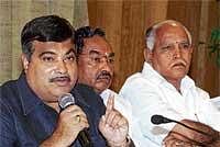 Here I Am: BJP National President Nitin Gadkari addressing the media in Bangalore on Sunday. BJP state President K S Eshwarappa and Chief Minister B S Yeddyurappa are seen. DH Photo