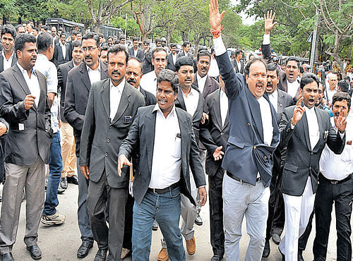 Lawyers in Mysuru protest against Monday's bomb blast on the court premises on Tuesday. To avert such incidents, advocates in Bengaluru want a comprehensive security system for the City Civil and Sessions Court. DH PHOTO