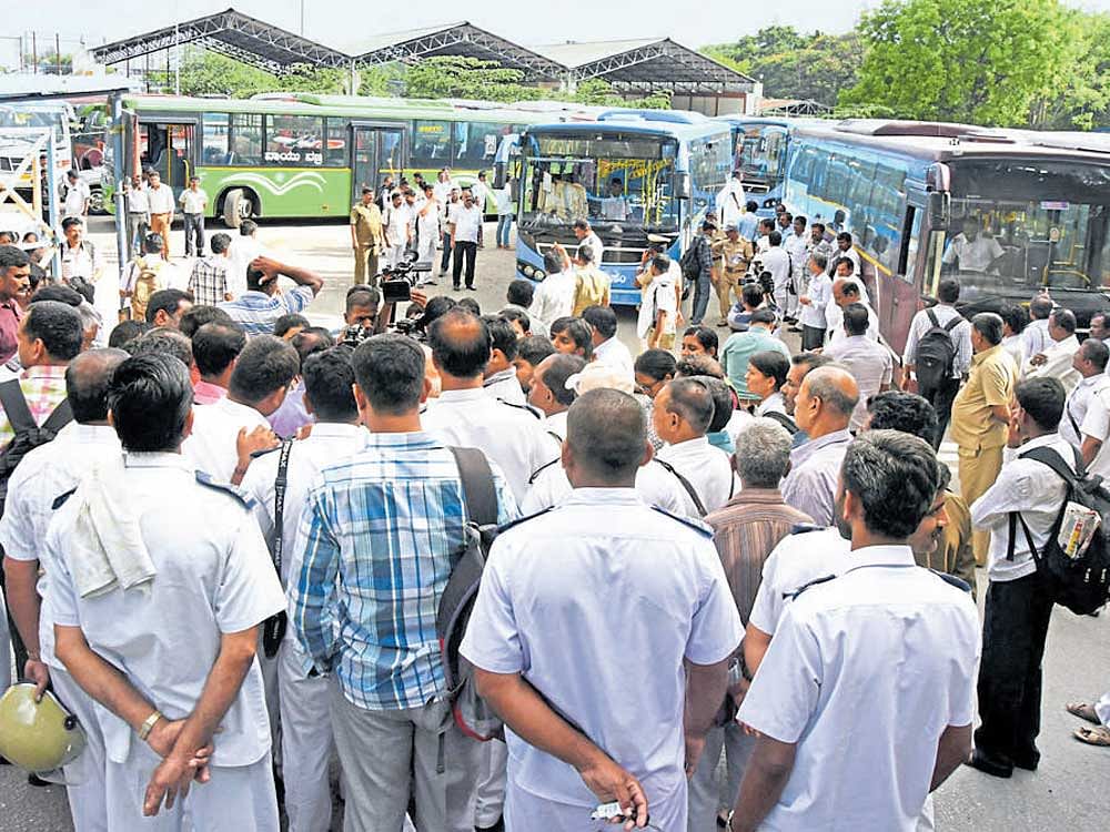 BMTC Volvo bus drivers and conductors staged a protest against depot manager Basappa  following his rude behaviour with women employees in Bengaluru on Thursday. DH photo