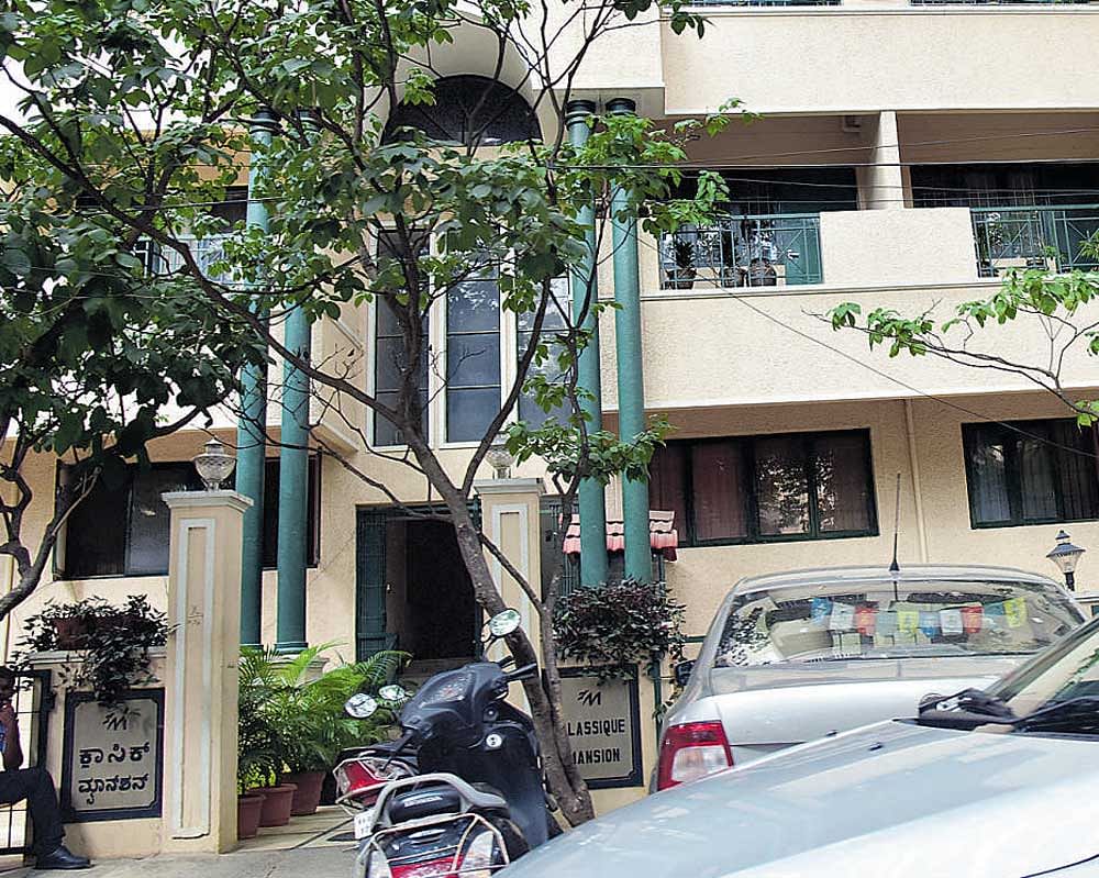 The apartment constructed on the encroached land  belonging to the BDA at Kodihalli. DH Photo