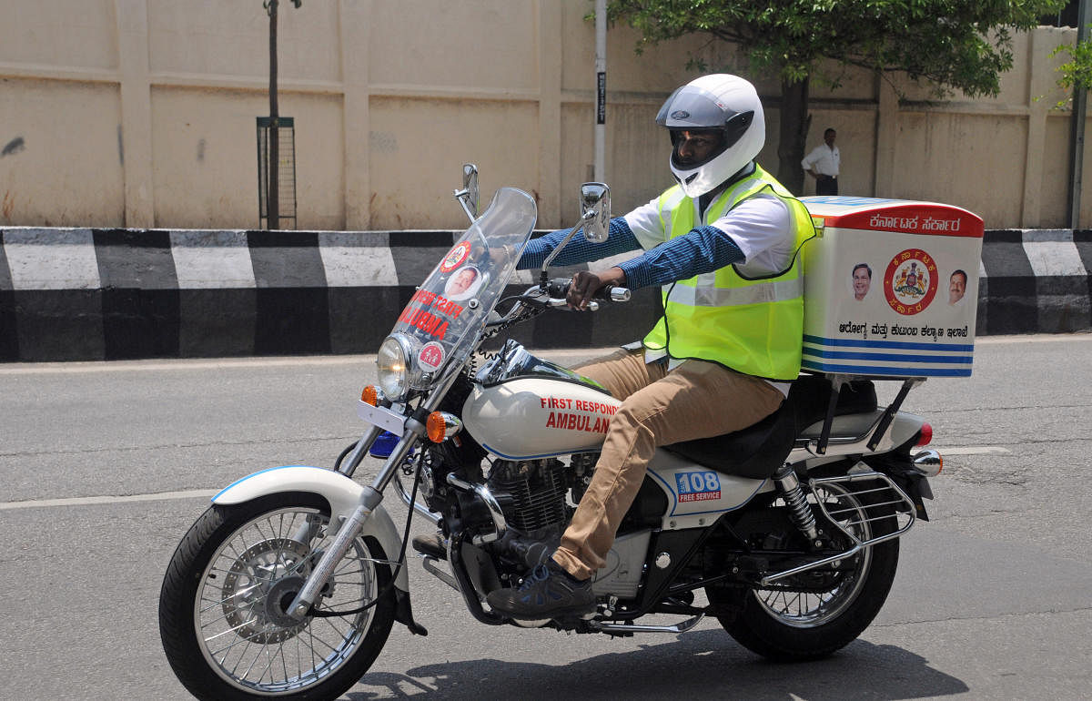 A medical assistant demonstrating with the motorbike ambulance during its pre launch press conference organised by Health and Family Welfare Department at Hotel Taj West End in Bengaluru on Tuesday. Photo by Satish Badigerbike ambulance