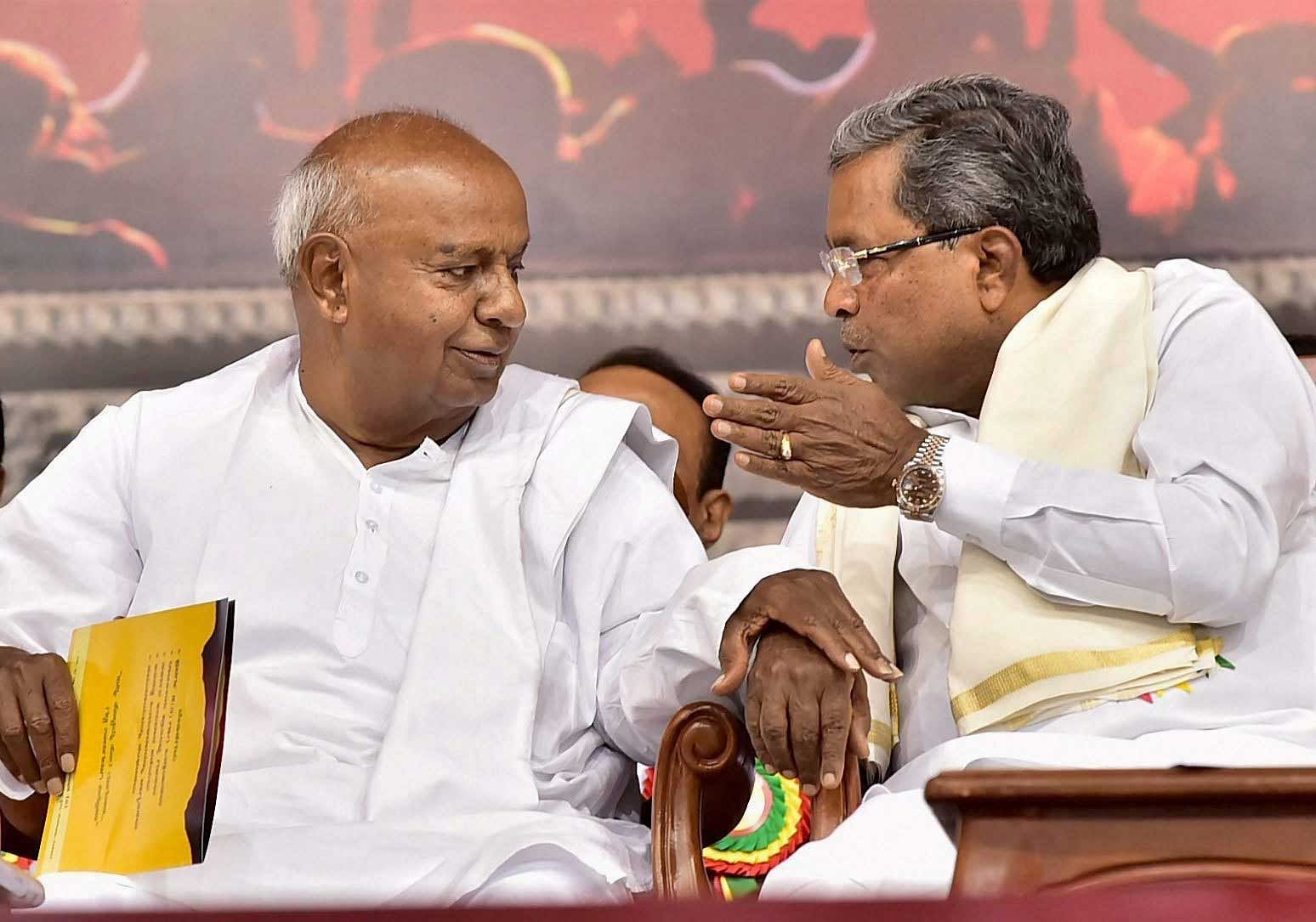 Deve Gowda and Siddaramaiah. DH file photo.