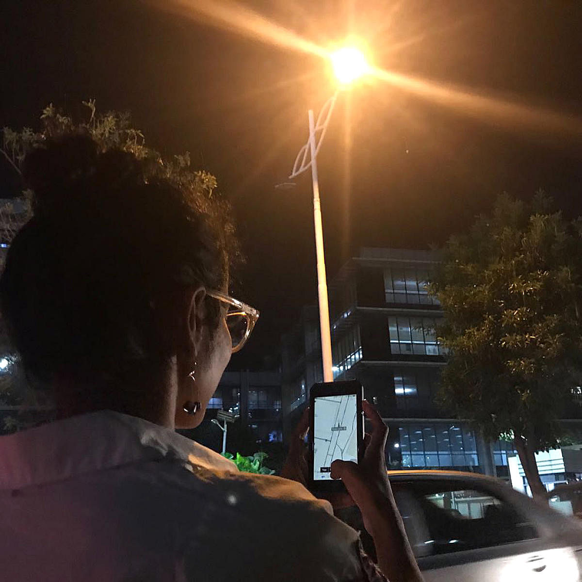 A citizen, Anindita Nayak, updating the status of streetlights using the apps – GoMap! and OpenStreetMap — at Outer Ring Road