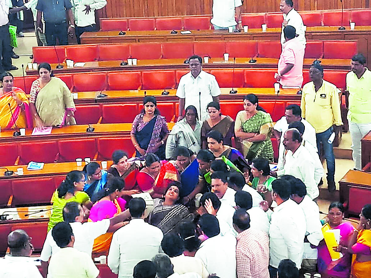 Congress corporator Roopa R faints at the BBMP council meeting on Friday. 