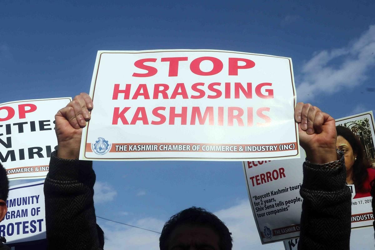 Kashmir trade bodies hold a demonstration against the attacks on the Kashmiri Muslim community in Jammu province and other parts of India in the wake of Pulwama attack. (Photo by Umer Asif)