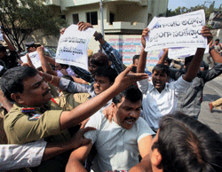 Police arrest Telangana supporters during a protest rally in Hyderabad on Thursday. PTI