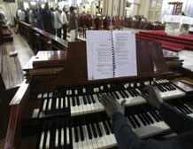 A choir member plays the piano during the morning Catholic mass after the announcement of the election of Argentine Cardinal Jorge Bergoglio as the new Pope, at the Holy Family Minor Basilica in Kenya's capital Nairobi March 14, 2013. Bergoglio of Argentina was elected in a surprise choice to be the new leader of the troubled Roman Catholic Church on Wednesday, taking the name Francis I and becoming the first non-European pontiff in nearly 1,300 years. REUTERS photo