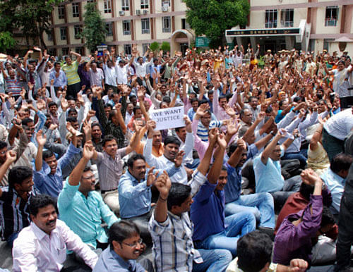 AP secretariat employees protest against the bifurcation of the Sate for creation of Telangana state, in Hyderabad on Saturday. PTI Photo