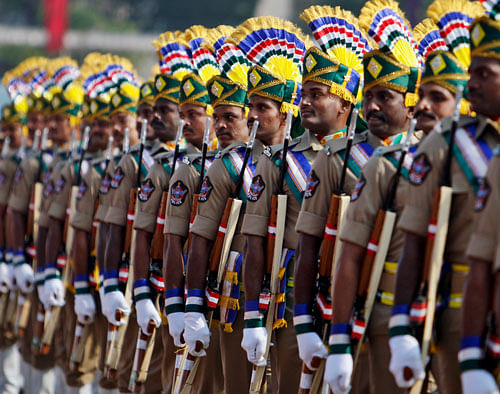 Andhra Pradesh Special Police (APSP) personnel march during Andhra Pradesh state formation day celebrations in Hyderabad, India, Friday, Nov. 1, 2013. AP Photo.