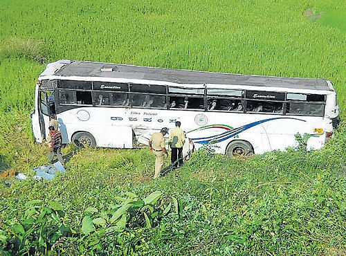 Deep Plunge: The KSRTC bus that fell into a farm land near Joginmutt in Siddapur taluk of  Uttara Kannada district on Friday morning. dh photo