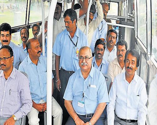 MLA&#8200;Vasu, accompanied by&#8200;KSRTC official Maqsoor Ahmed, director of BRBNML S&#8200;Madhav Rao goes on an inaugural ride on a KSRTC&#8200;bus, in Mysore, on&#8200;Wednesday. DH Photo