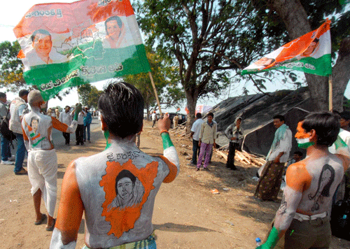 Congress supporters at a public meeting of Congress President Sonia Gandhi at Andole in Medak district of Telangana region on Sunday. PTI Photo
