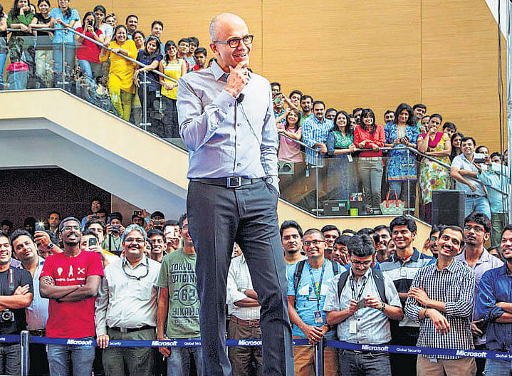 Microsoft CEOSatya Nadella interacts with the employees during a visit to the Hyderabad office on Monday. PTI